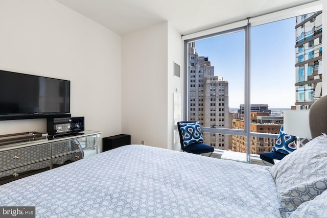 1414 S Penn Sq Unit 28A, Philadelphia, PA 19102 - bedroom with a city view and floor to ceiling windows