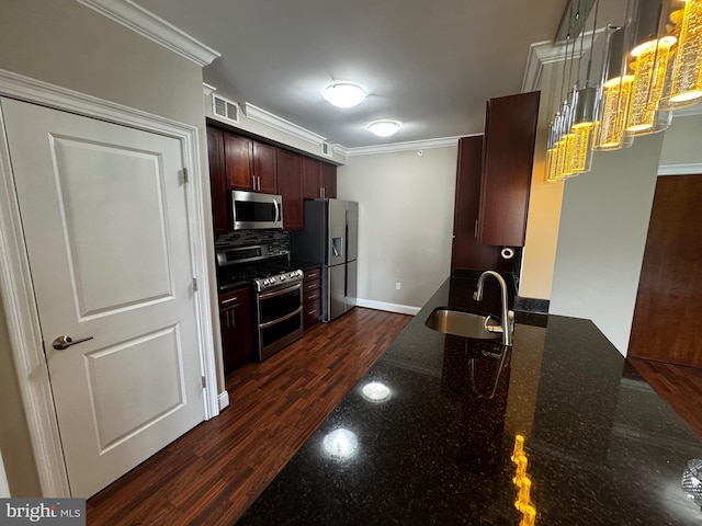 6301 Edsall Rd Unit 224, Alexandria, VA 22312 - kitchen featuring stainless steel appliances, crown molding, decorative backsplash, dark stone counters, and dark wood finished floors