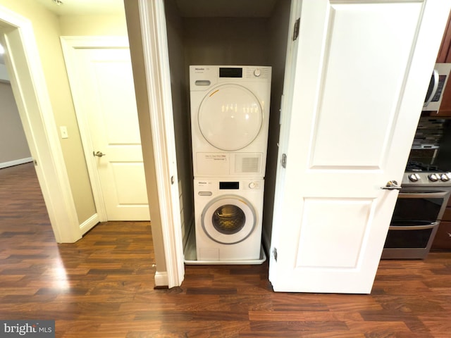 6301 Edsall Rd Unit 224, Alexandria, VA 22312 - laundry room featuring estacked washer and dryer and dark wood-style flooring