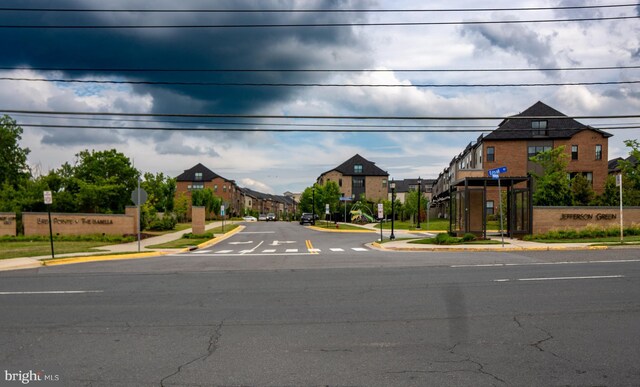 6301 Edsall Rd Unit 224, Alexandria, VA 22312 - view of asphalt street with traffic signs, sidewalks, curbs, and a residential view
