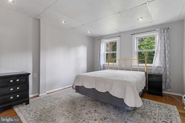 12 E Charles St, Palmyra, NJ 08065 - bedroom with wood finished floors and a paneled ceiling