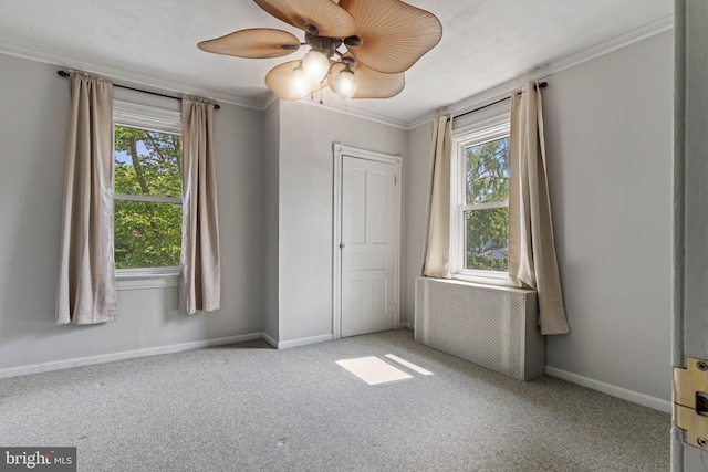 12 E Charles St, Palmyra, NJ 08065 - spare room featuring plenty of natural light, a ceiling fan, carpet, and ornamental molding