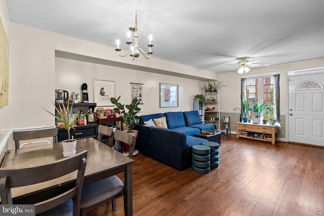841 Mchenry St, Baltimore, MD 21230 - living room featuring a chandelier, wood finished floors, and a ceiling fan