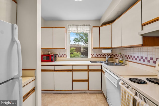 841 Mchenry St, Baltimore, MD 21230 - kitchen with white appliances, a sink, light countertops, and decorative backsplash