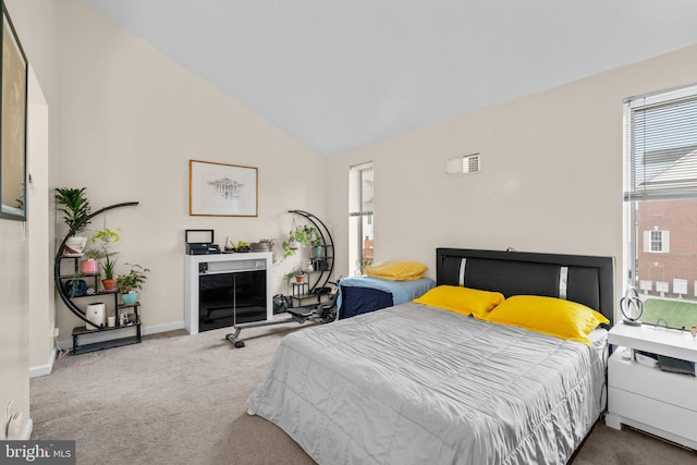 841 Mchenry St, Baltimore, MD 21230 - carpeted bedroom featuring multiple windows, lofted ceiling, and baseboards