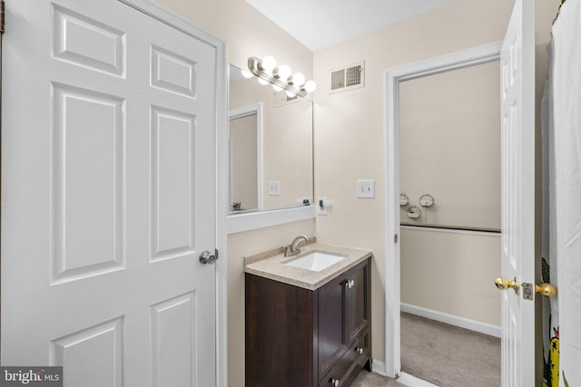 841 Mchenry St, Baltimore, MD 21230 - bathroom with vanity and baseboards