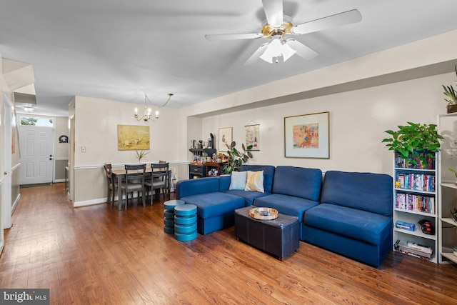 841 Mchenry St, Baltimore, MD 21230 - living area featuring a chandelier, wood finished floors, and a ceiling fan