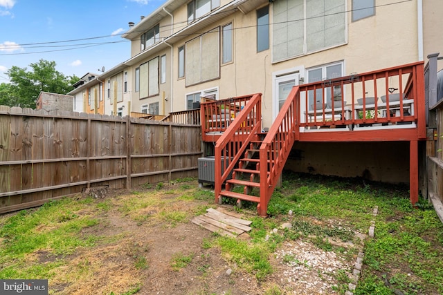 841 Mchenry St, Baltimore, MD 21230 - rear view of property featuring a wooden deck and stucco siding