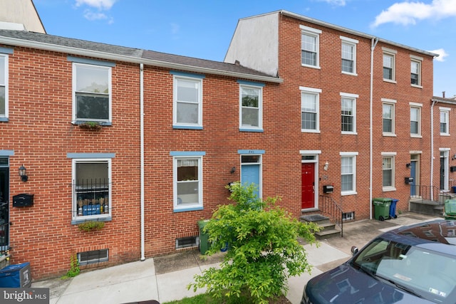 841 Mchenry St, Baltimore, MD 21230 - townhome / multi-family property with brick siding and a shingled roof