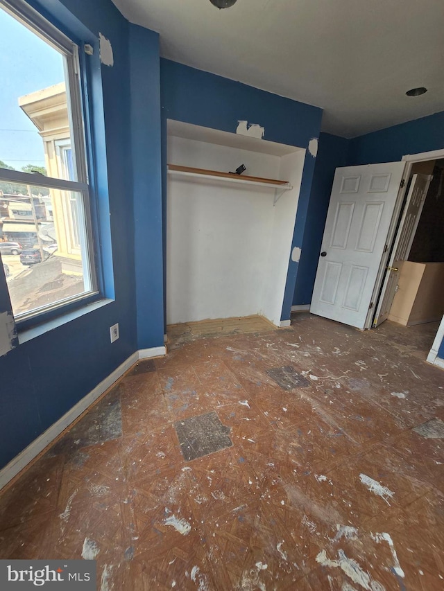 3951 N Delhi St, Philadelphia, PA 19140 - unfurnished bedroom featuring a closet and baseboards