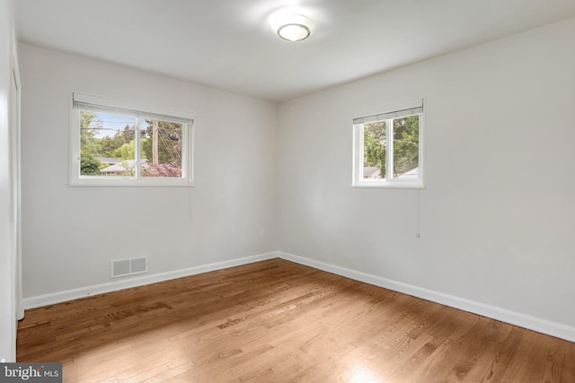 9309 E Parkhill Dr, Bethesda, MD 20814 - spare room featuring baseboards and wood finished floors
