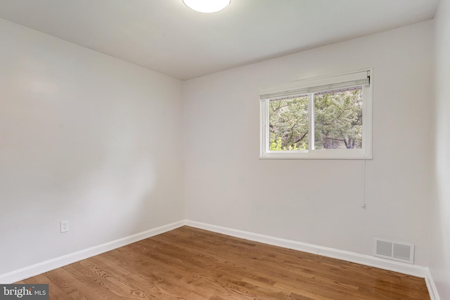 9309 E Parkhill Dr, Bethesda, MD 20814 - spare room with baseboards and wood finished floors