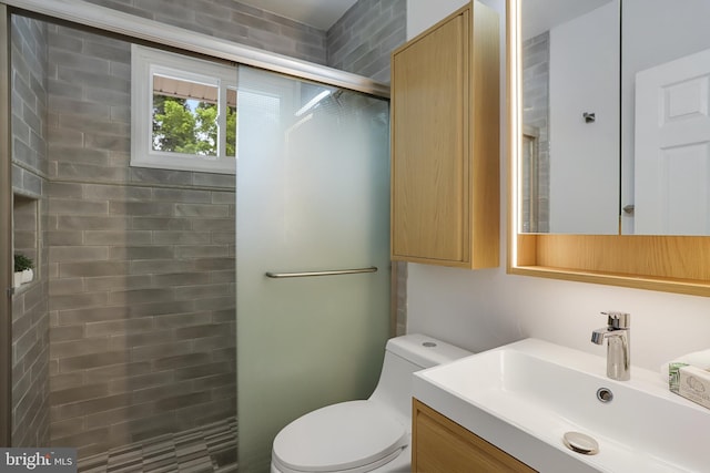 9309 E Parkhill Dr, Bethesda, MD 20814 - full bath featuring vanity, toilet, and tiled shower