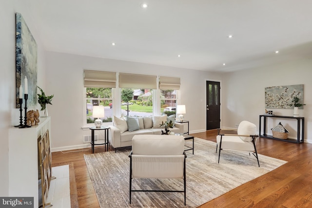 9309 E Parkhill Dr, Bethesda, MD 20814 - living room featuring wood finished floors, recessed lighting, and baseboards