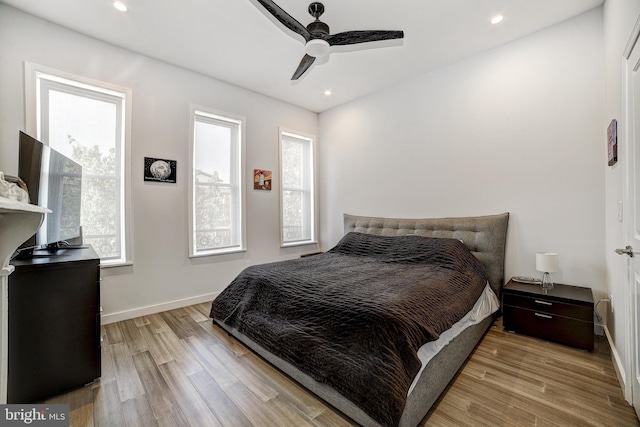 107 W Ostend St, Baltimore, MD 21230 - bedroom with wood finished floors, baseboards, ceiling fan, and recessed lighting