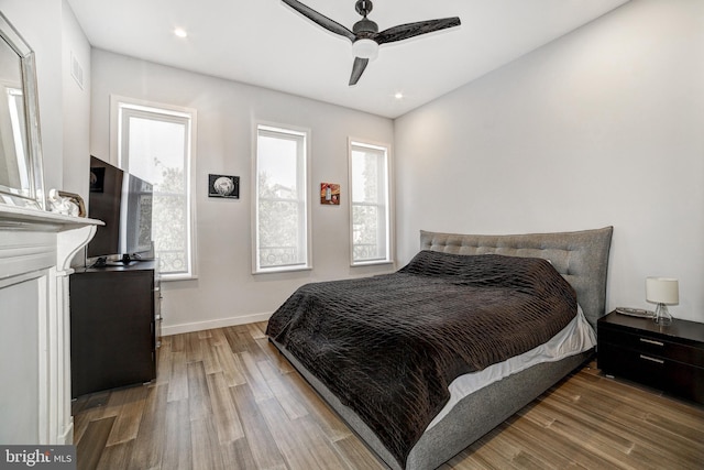 107 W Ostend St, Baltimore, MD 21230 - bedroom featuring wood finished floors, baseboards, a ceiling fan, and recessed lighting
