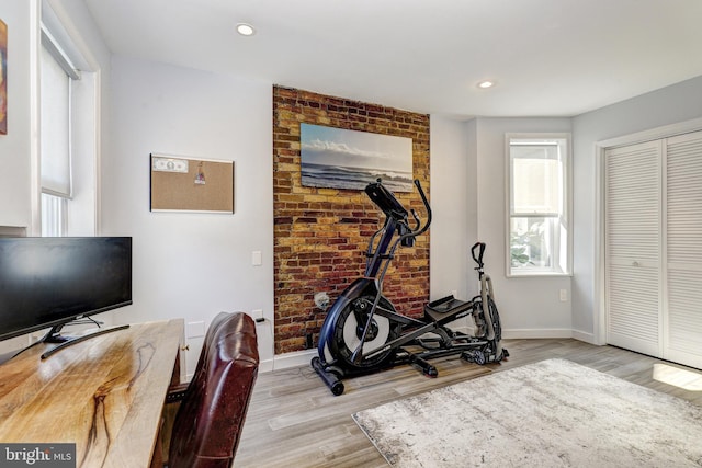 107 W Ostend St, Baltimore, MD 21230 - exercise area featuring baseboards, wood finished floors, and recessed lighting