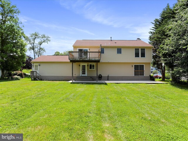 1946 Londontowne Dr, Hagerstown, MD 21740 - rear view of house featuring a patio, a yard, and a wooden deck