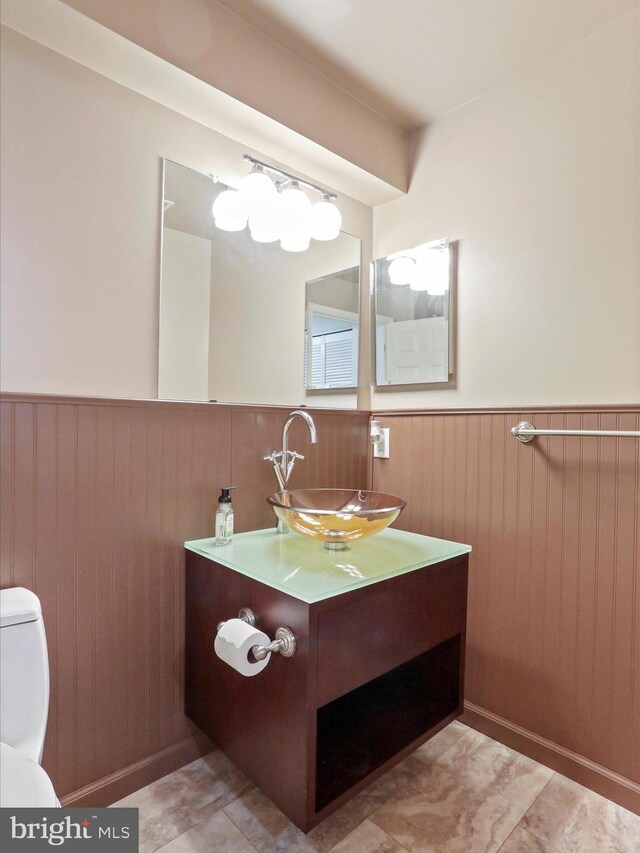1946 Londontowne Dr, Hagerstown, MD 21740 - half bath with wainscoting, vanity, and wood walls