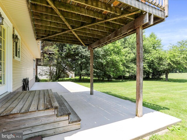 1946 Londontowne Dr, Hagerstown, MD 21740 - wooden terrace with a patio area and a lawn