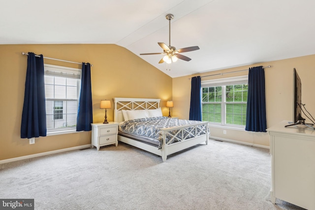 702 Iris Ln, Media, PA 19063 - carpeted bedroom with vaulted ceiling, baseboards, and a ceiling fan