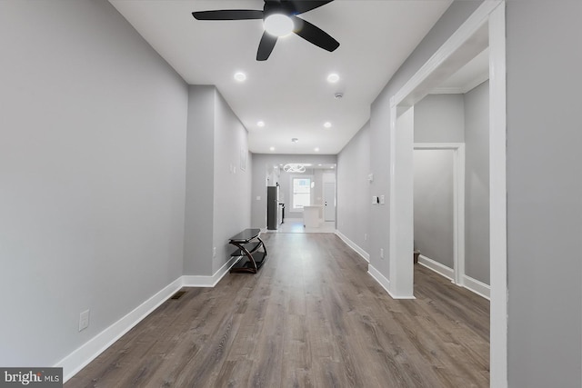 538 N Lakewood Ave, Baltimore, MD 21205 - corridor with wood finished floors, baseboards, and recessed lighting