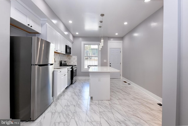 538 N Lakewood Ave, Baltimore, MD 21205 - kitchen featuring appliances with stainless steel finishes, a center island, light marble finish floors, light countertops, and recessed lighting