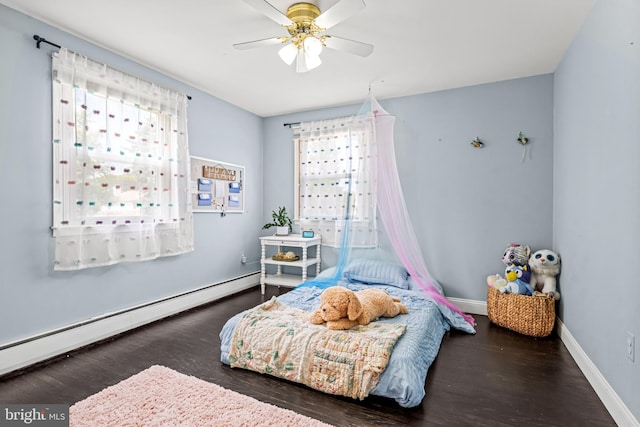 73 Swallow, Southampton, PA 18966 - bedroom with a baseboard heating unit, wood finished floors, baseboards, and a ceiling fan