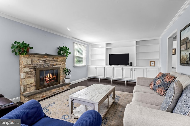 73 Swallow, Southampton, PA 18966 - living area with baseboards, a fireplace, dark wood finished floors, crown molding, and built in shelves