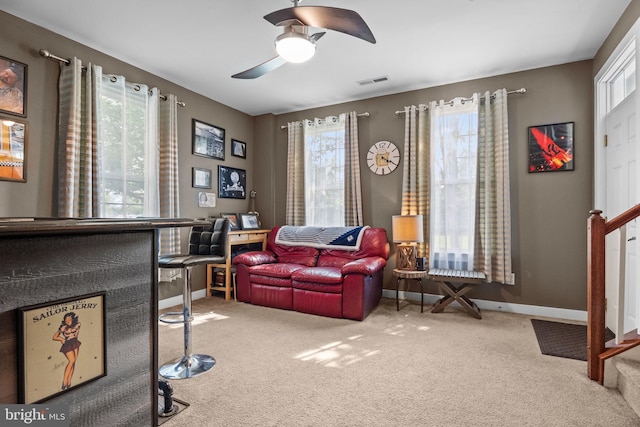 135A Equestrian Row, Bensalem, PA 19020 - living room with carpet floors, stairs, baseboards, and ceiling fan