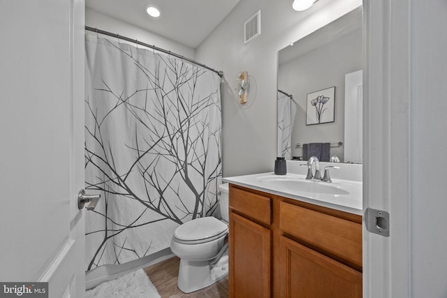 135A Equestrian Row, Bensalem, PA 19020 - bathroom with vanity, toilet, wood finished floors, and curtained shower