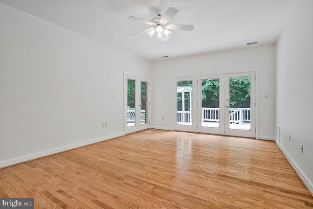 3170 Hickory Ridge Rd, Dunkirk, MD 20754 - spare room featuring french doors, light wood-type flooring, ceiling fan, and baseboards