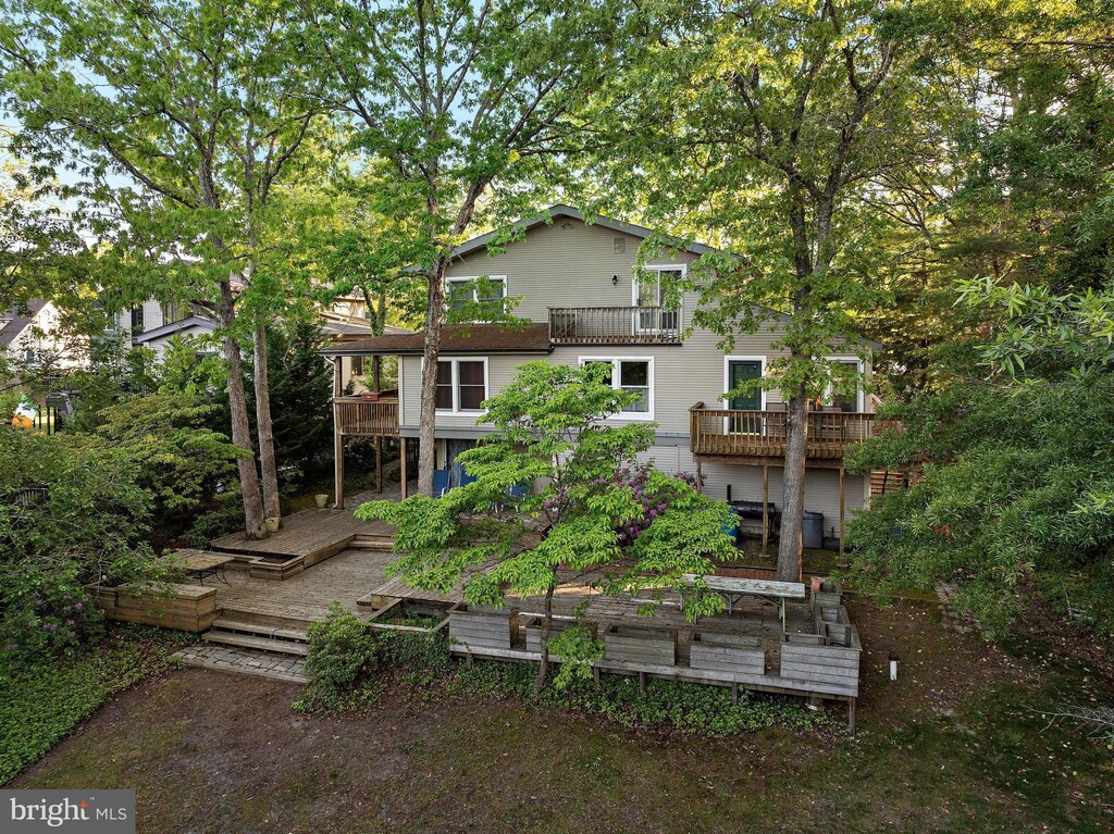 833 Buccaneer, Manahawkin, NJ 08050 - back of house featuring a balcony and a wooden deck