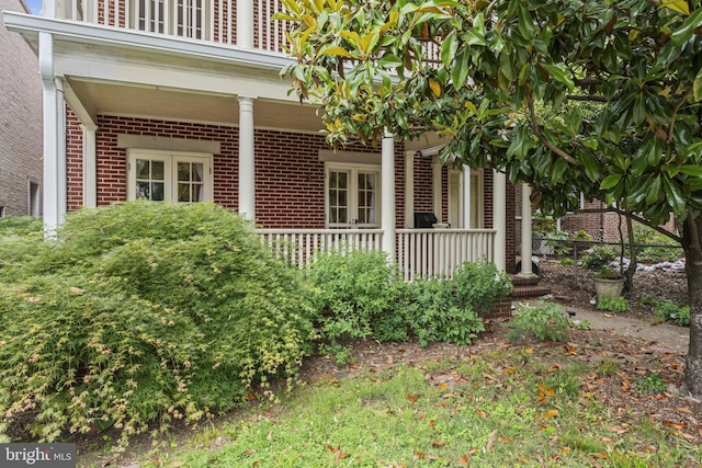 4036 Roland Ave, Baltimore, MD 21211 - property entrance with brick siding and covered porch
