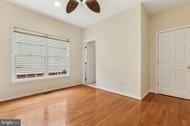 43229 Augustine Pl, Ashburn, VA 20147 - unfurnished bedroom featuring baseboards, hardwood / wood-style flooring, and a ceiling fan