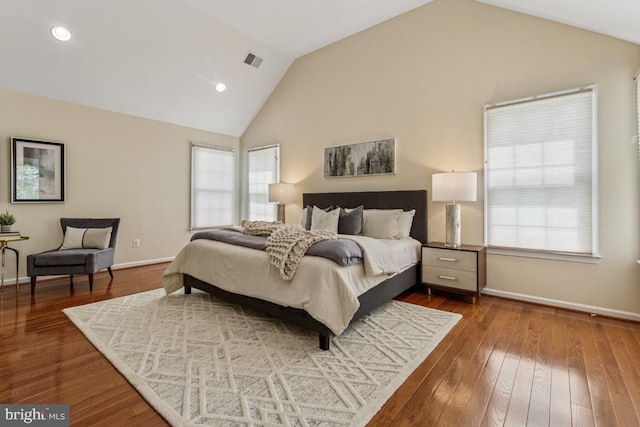43229 Augustine Pl, Ashburn, VA 20147 - bedroom with vaulted ceiling, baseboards, multiple windows, dark wood-style flooring, and recessed lighting