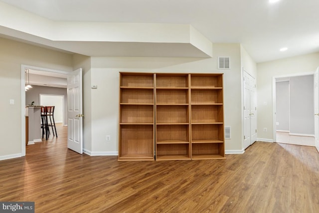 43229 Augustine Pl, Ashburn, VA 20147 - unfurnished bedroom featuring wood finished floors, baseboards, and recessed lighting