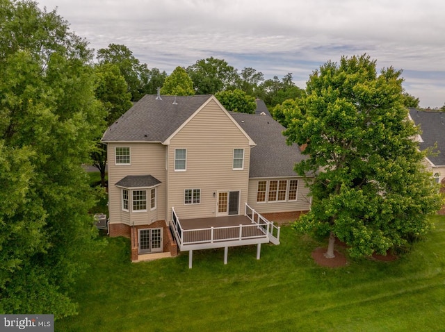 43229 Augustine Pl, Ashburn, VA 20147 - back of house featuring a shingled roof and a yard