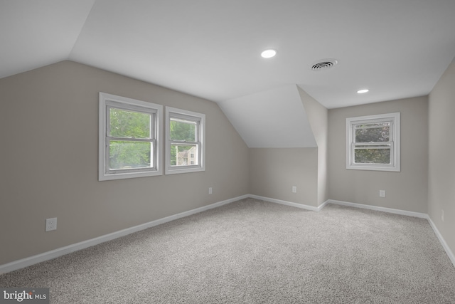 10561 Georgetown Rd, Laurel, DE 19956 - additional living space featuring vaulted ceiling, healthy amount of natural light, baseboards, carpet floors, and recessed lighting