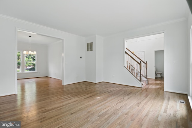 43175 Burstall Ct, Leesburg, VA 20176 - unfurnished living room featuring a chandelier, stairs, ornamental molding, light wood-type flooring, and baseboards