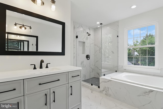 43175 Burstall Ct, Leesburg, VA 20176 - bathroom with marble tiled floors, a garden tub, a marble finish shower, vanity, and recessed lighting