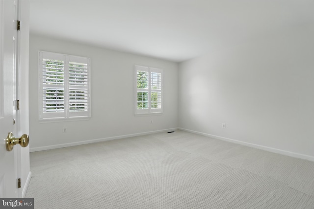 43175 Burstall Ct, Leesburg, VA 20176 - spare room featuring light colored carpet and baseboards