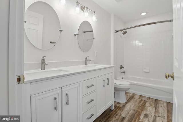 43175 Burstall Ct, Leesburg, VA 20176 - bathroom with toilet, double vanity, shower / bath combination, and wood finished floors