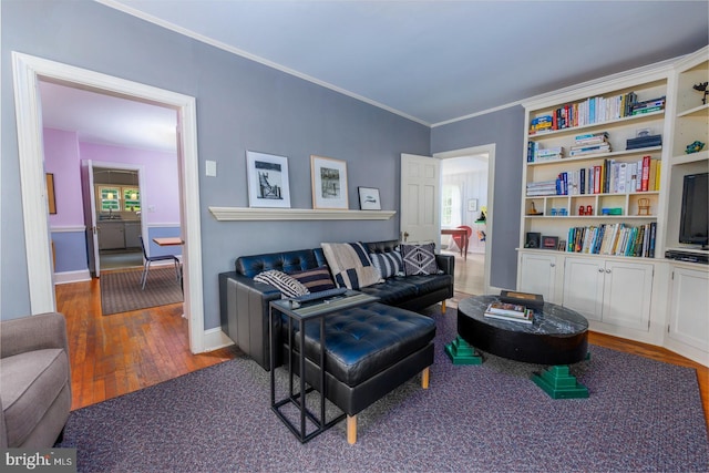 27843 Saint Michaels Rd, Easton, MD 21601 - living area featuring wood finished floors, plenty of natural light, ornamental molding, and baseboards