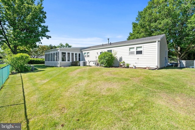 10004 Farrar Ct, Cheltenham, MD 20623 - back of property with a sunroom and central AC unit