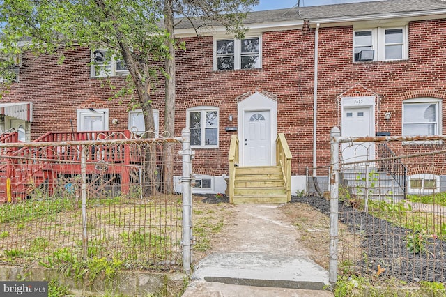 3613 Saint Victor St, Baltimore, MD 21225 - multi unit property with brick siding, entry steps, and roof with shingles