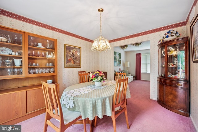 1004 Truman Rd, East Norriton, PA 19403 - dining area with a chandelier, wallpapered walls, and carpet floors