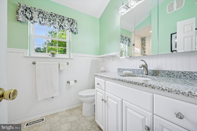 1004 Truman Rd, East Norriton, PA 19403 - bathroom with a wainscoted wall, vanity, and toilet