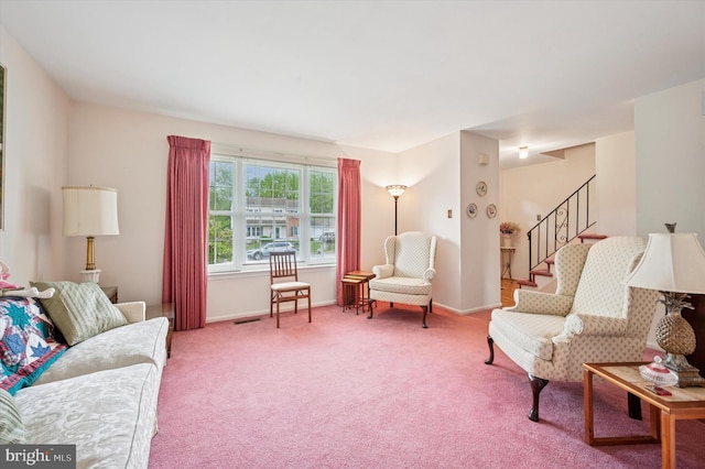 1004 Truman Rd, East Norriton, PA 19403 - living room with light colored carpet, stairway, and baseboards