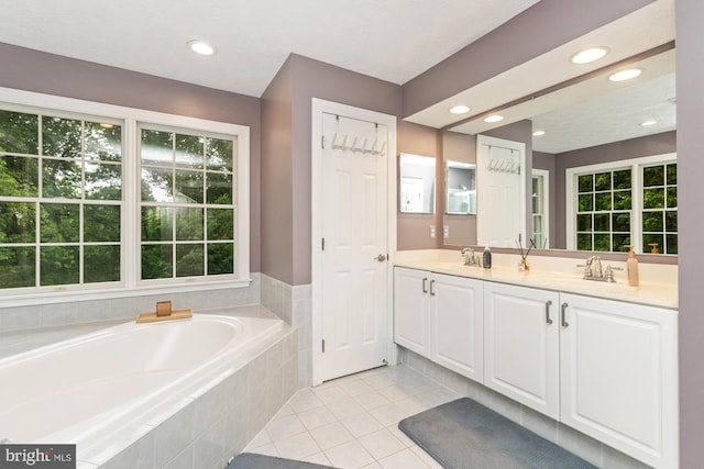8 Lochwell Ct, Baltimore, MD 21234 - full bathroom with a garden tub, double vanity, recessed lighting, plenty of natural light, and tile patterned flooring
